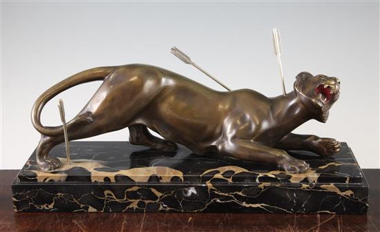 Louis Caruin. A French Art Deco patinated bronze model of a wounded tiger, 18.5in.